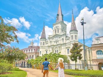 couple standing in front of church during their 3 days in new orleans getaway