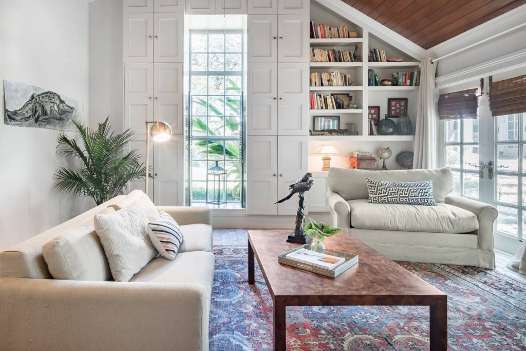 Photo of the living room inside an uptown garden studio Airbnb in New Orleans. 