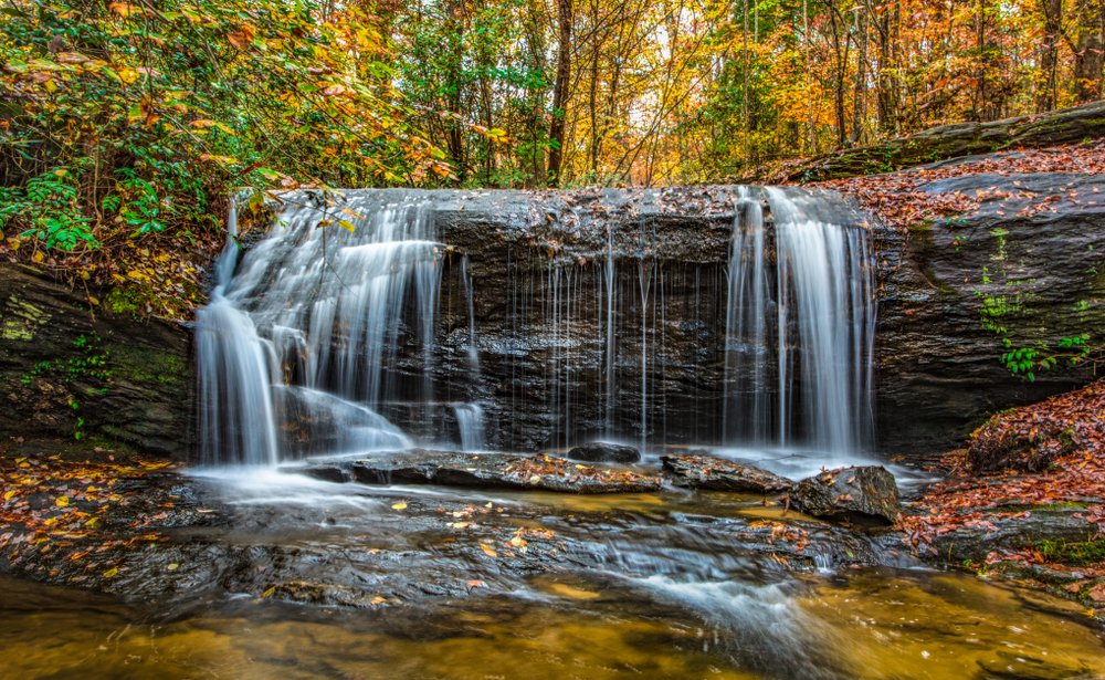 A beautiful waterfall and fall foliage in South Carolina.