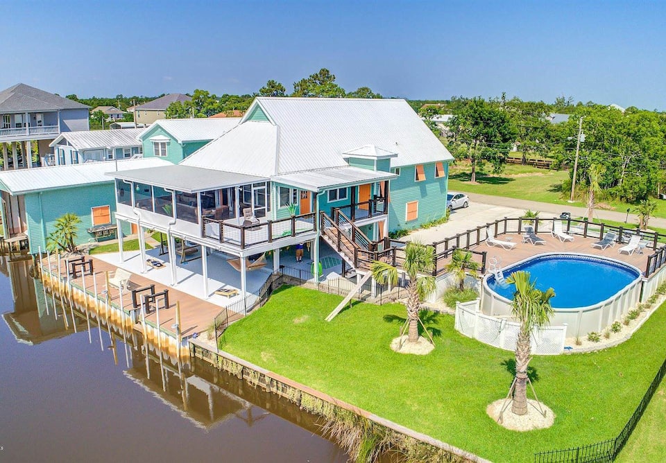 This is an amazing home on the water with private pools for large groups in Bay St. Louis Mississippi 