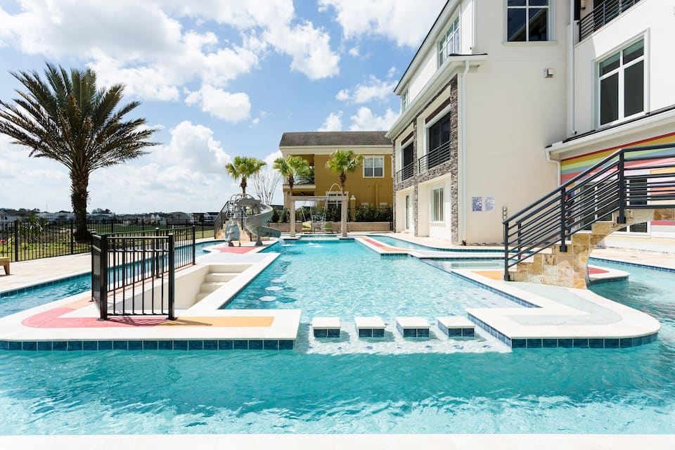  There is a rooftop pool and a private lazy river that goes around perfect for the relaxing under the Florida sun at this airbnb in Orlando Florida