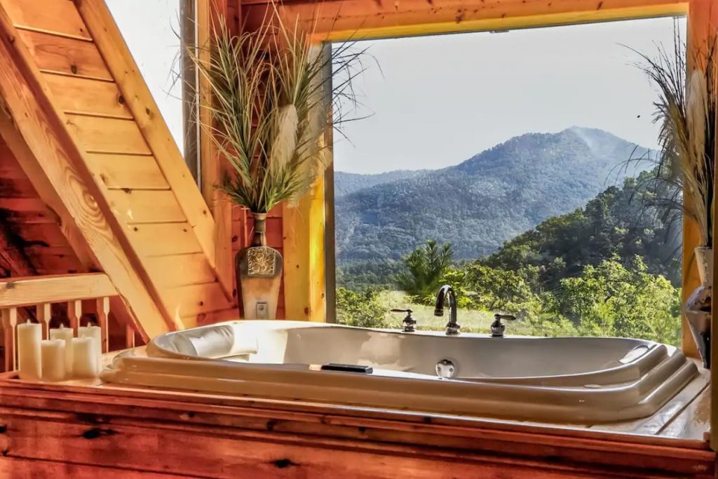 The view of the Great Smoky Mountains from a jacuzzi tub in one of the coziest cabins in the South