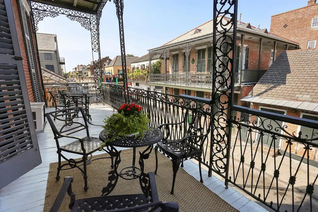 Photo of an over-sized balcony at a Victorian suite Airbnb in New Orleans. 