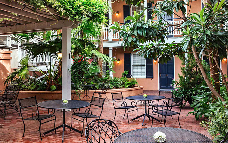 this bed and breakfast in charleston has a gorgeous outdoor pation