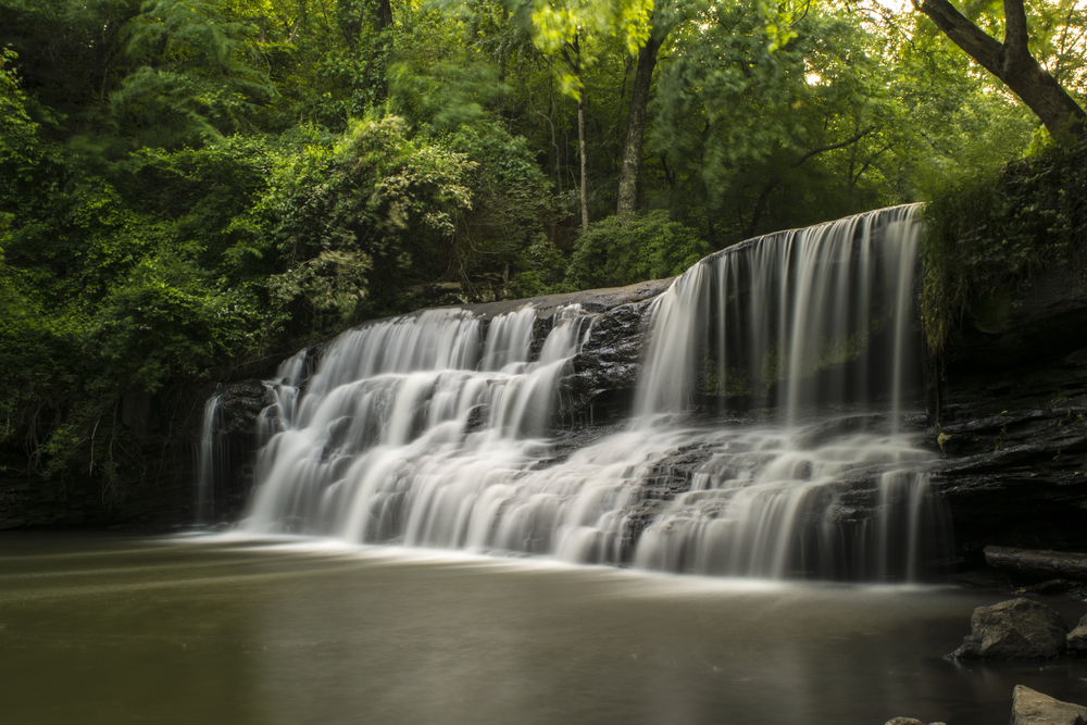Photo of Mardi Mills Falls, one of  the prettiest waterfalls in Alabama with a swimming hole at the bottom