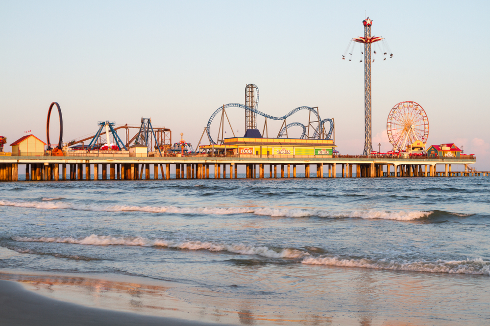 Photo of Pleasure Pier, an over-water waterpark on Galveston Island, one of the best weekend getaways in Texas.