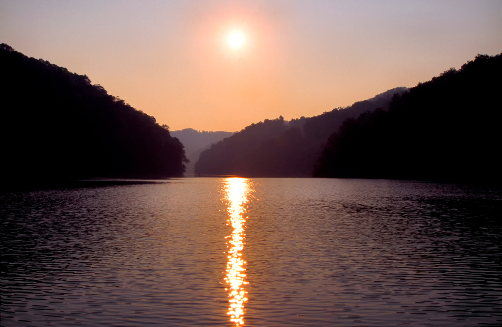 A dramatic sunset on the waters of Buckhorn State Resort Park.