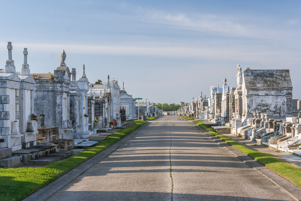 A large historic cemetery in New Orleans on a sunny day