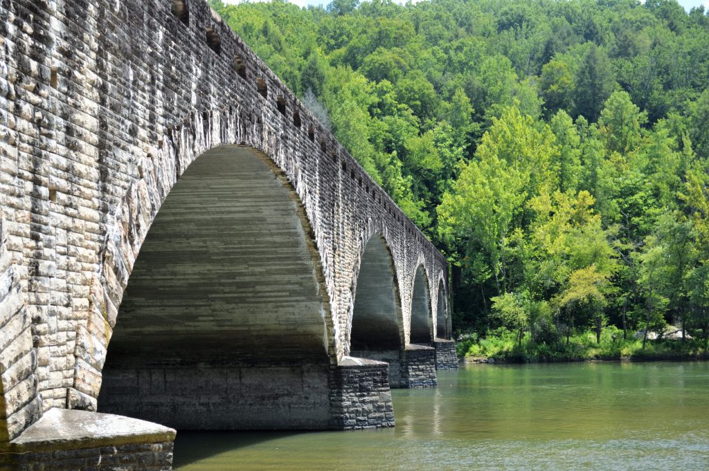 A stone bridge crosses the Cumberland River in Cumberland Falls State Resort Park.