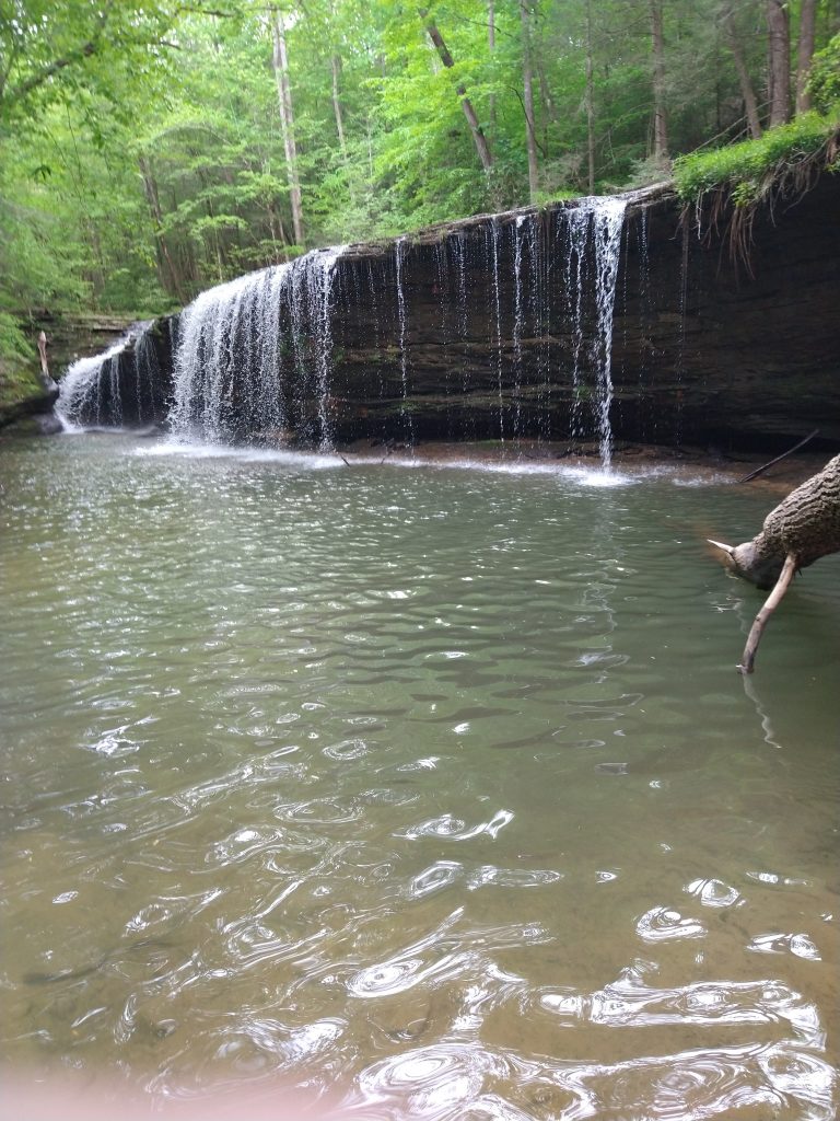 Princess Falls flows over an angled rock in Kentucky.