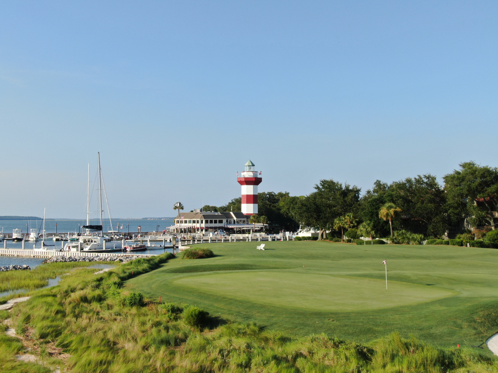 Photo of the lighthouse and harbor at Hilton Head Island, one of the best day trips from Savannah.