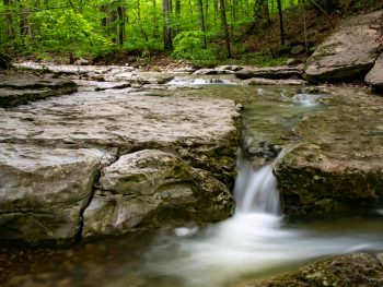 A beautiful waterfall on Lost Valley Trail, one of the most scenic trails in Arkansas