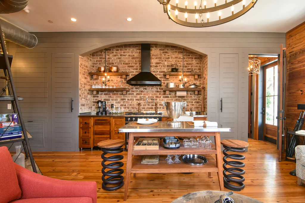 A gorgeous photo of a rustic kitchen in a VRBO in Charleston.