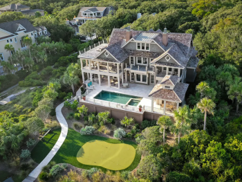 photo of one of the best vacation rentals in Charleston showing a pool and golf course