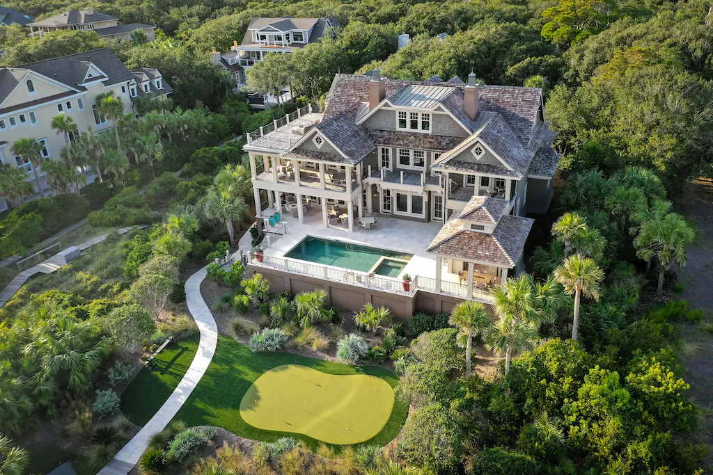 photo of one of the best vacation rentals in Charleston showing a pool and golf course