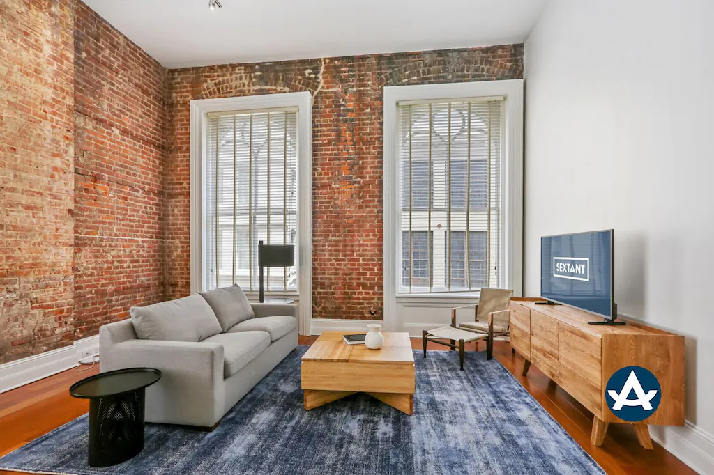 The brick interior of this New Orleans VRBO gives this rental charm and personality