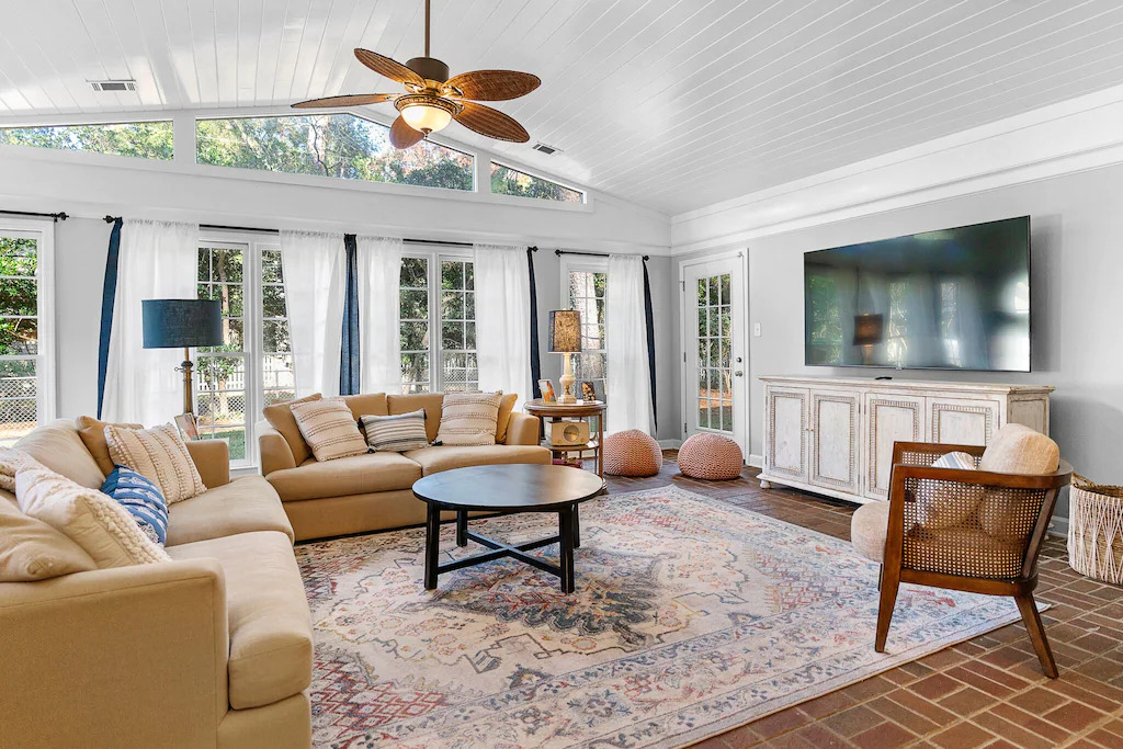 Photo of the living room inside Isle of Hope Charmer, one of the best vacation rentals in Savannah's Moon River District.