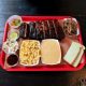 tray of the best BBQ in nashville with delicious food options on it