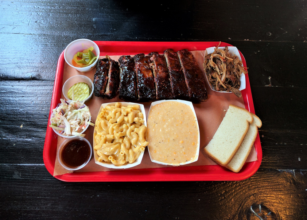 tray of the best BBQ in nashville with delicious food options on it