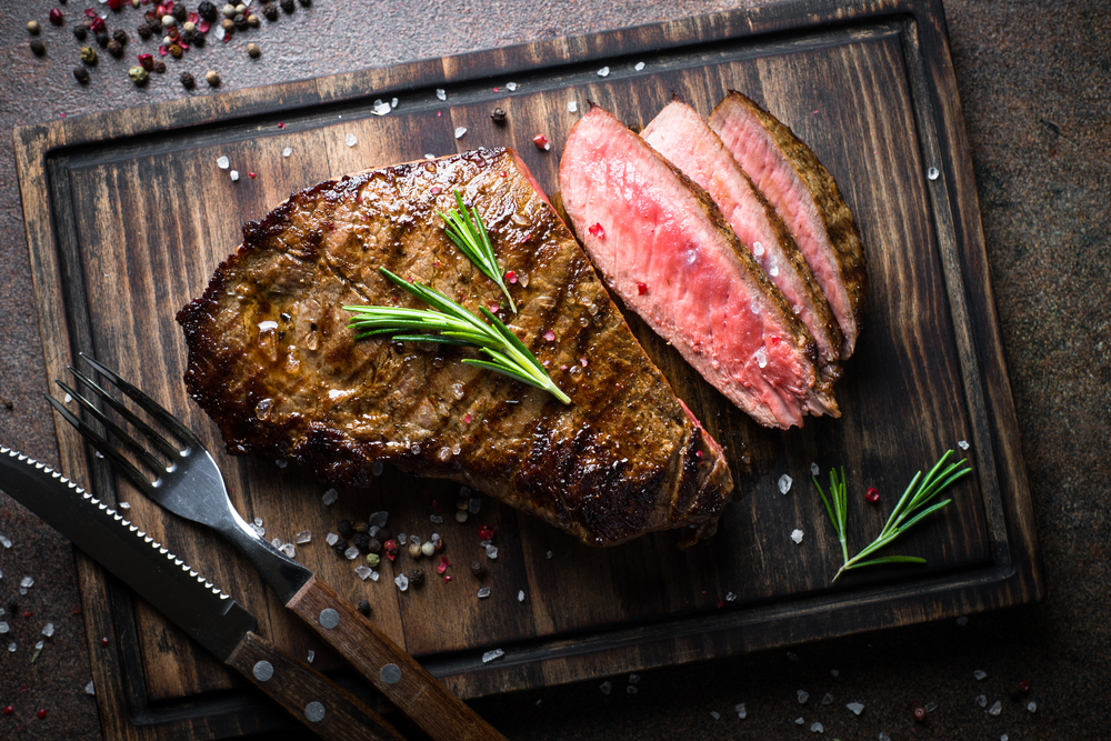 photo of a sliced steak 