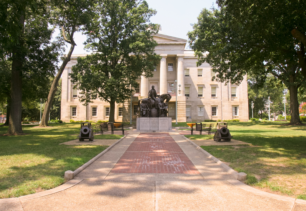 walkway and cannons in front of the raleigh capitol building