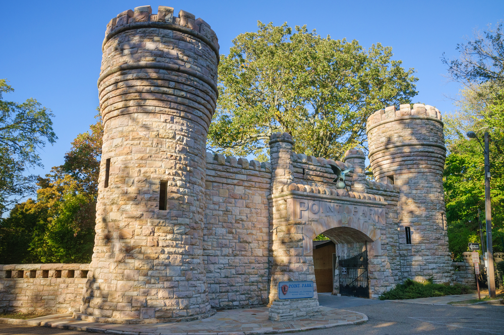 Photo of the castle entrance into Point Park with its gates open to allow cars to drive through.