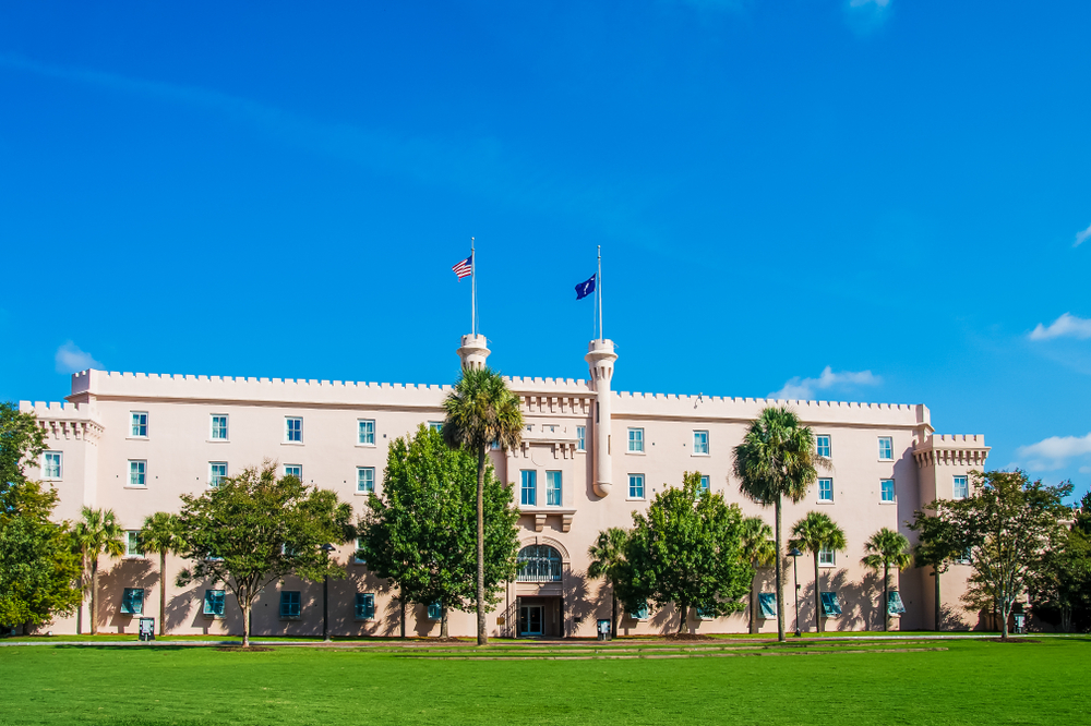 Photo of the castle in the south, The Citadel with two flags flying from its center turrets. 