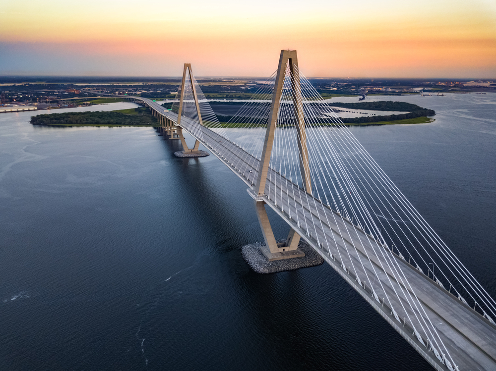 Aerial photo of the Ravenel Bridge at sunset.