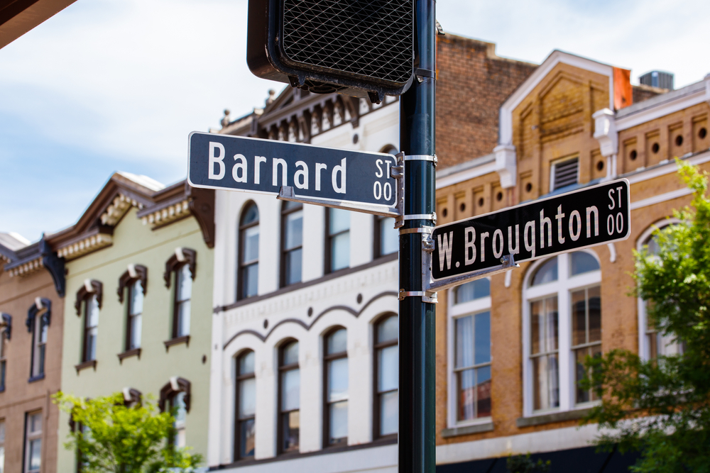 A road sign showing the intersections between Broughton Street and Barnard Street in an article about shopping in Savannah