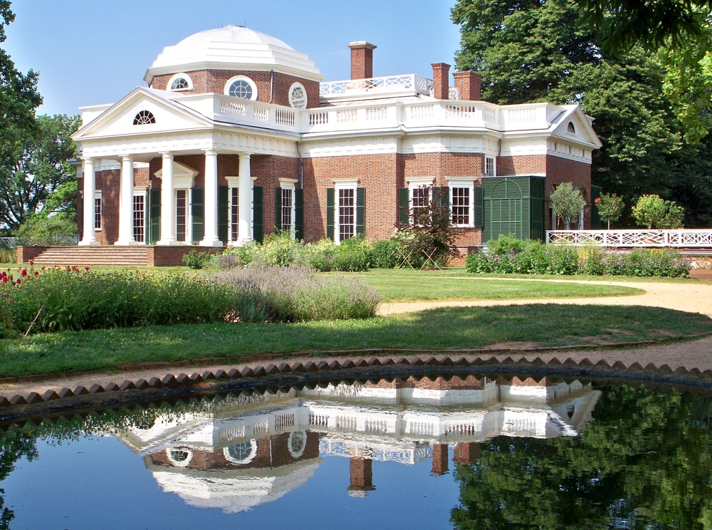 Thomas Jefferson's Monticello and gardens with a reflecting pond.