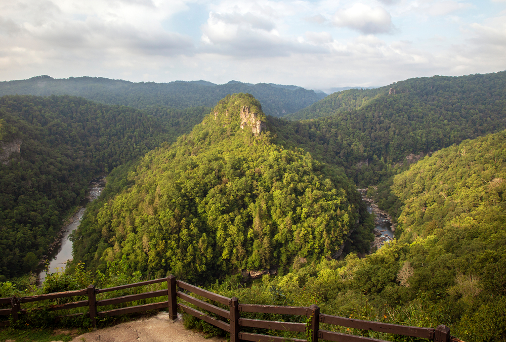 Photo of a river running through a deep gorge surrounded by mountains at Breaks Interstate Park.