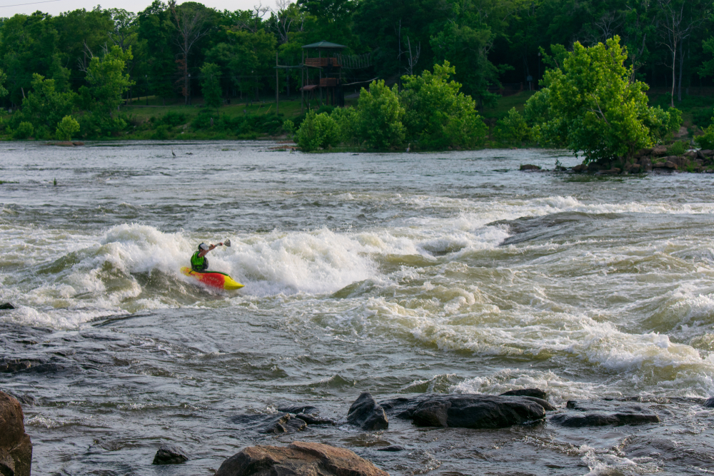 Photo of a kayaker rafting on the Chattahoochee River.