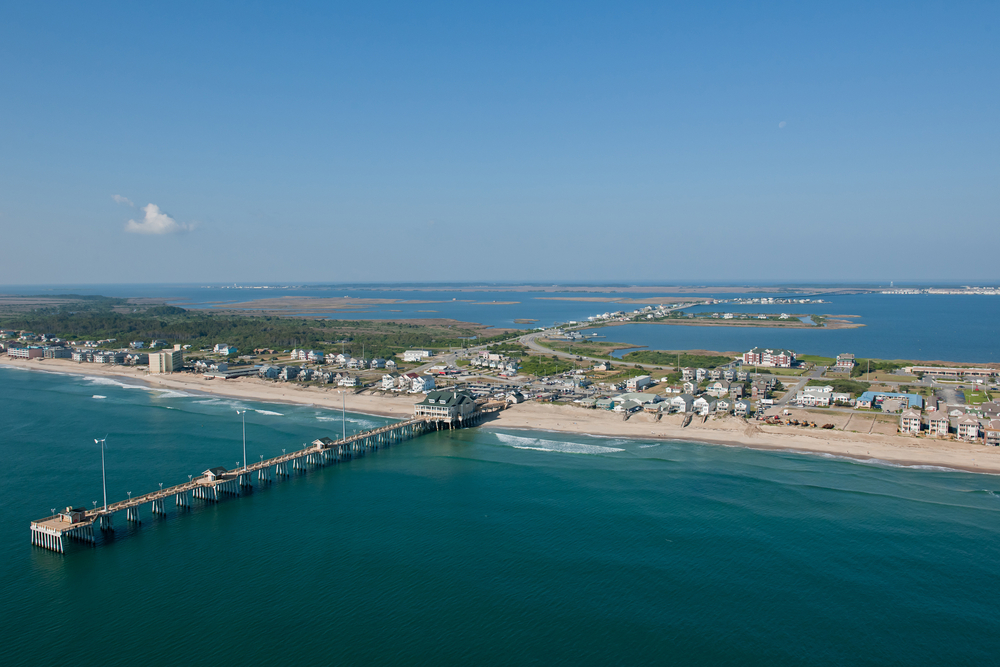 ariel photo of beach and pier