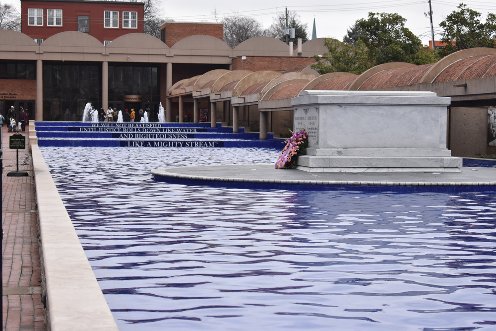 Part of the Martin Luther King Historic District there is a blue reflecting pond and a casket for Dr. Martin Luther KIng