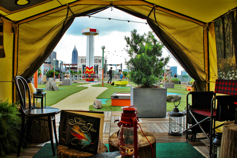 On the Rooftop of Ponce City Market you will find cozy restaurants space with yard games and a pathway