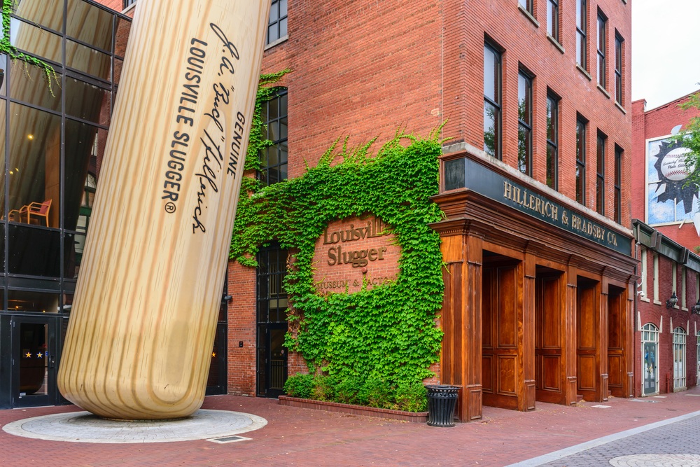 Entrance to the Louisville Slugger Factory, with giant baseball bat sculpture, one of the best things to do in Kentucky.