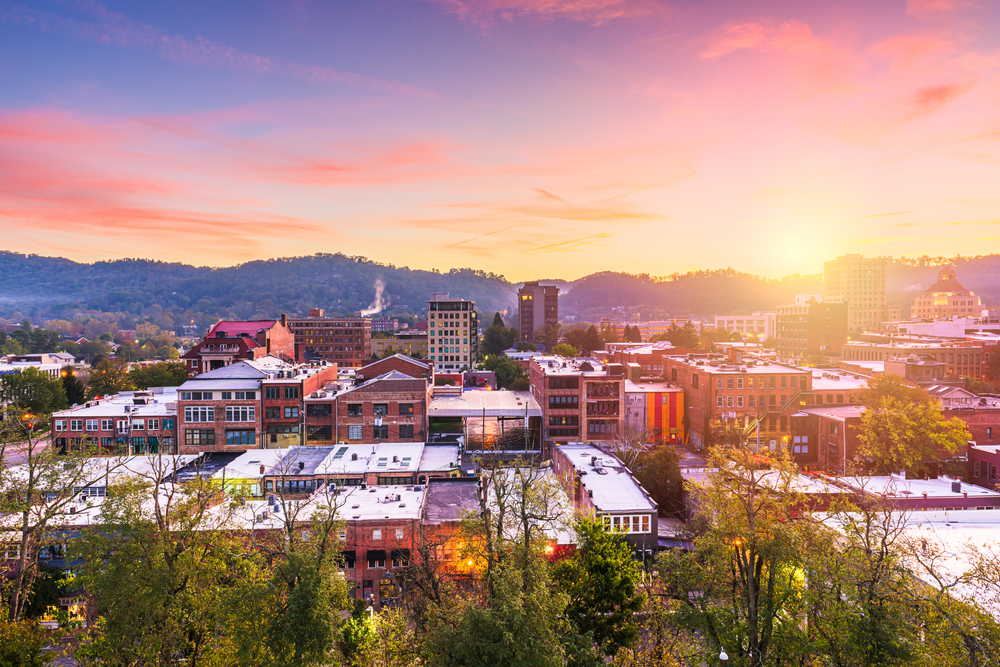 Pink and purple sunset over downtown Asheville, NC.