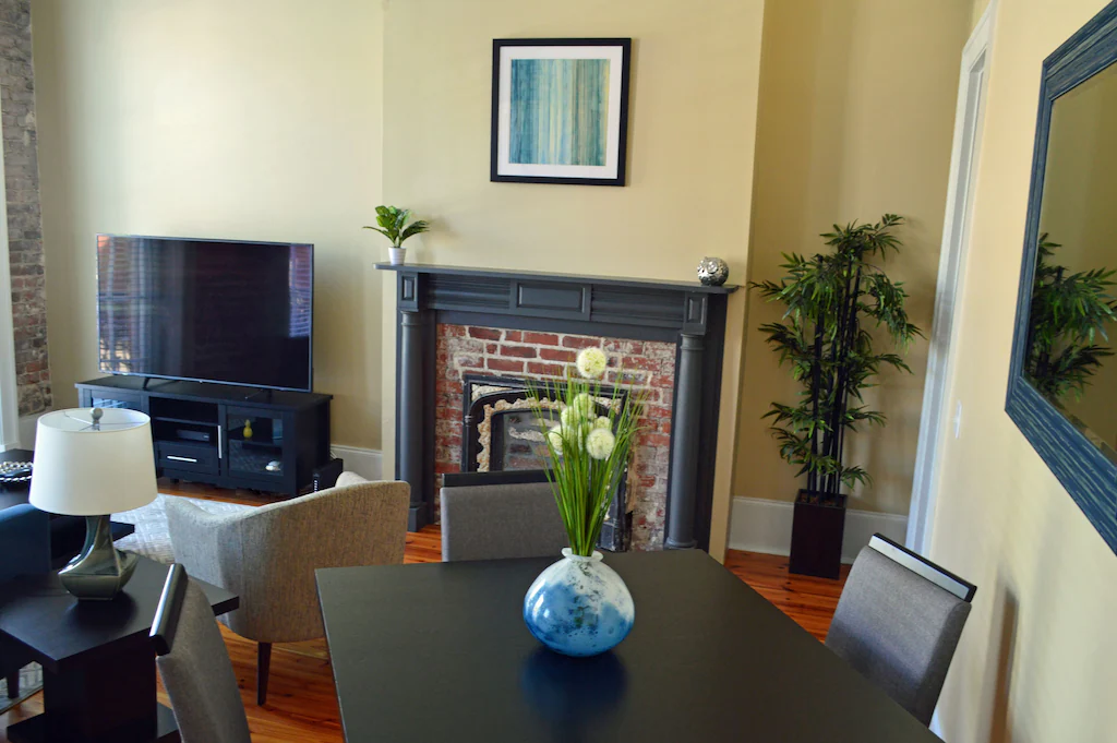 With a fireplace and modern furnishings, you'll feel right at home in the Julia Street Condo.
