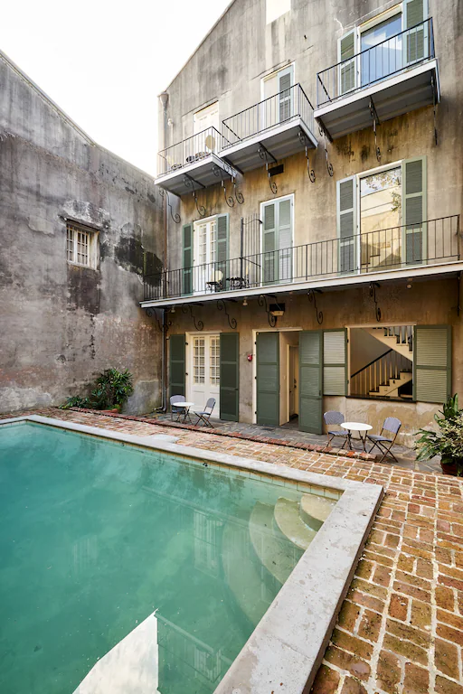 A beautiful pool adds to the character of one of the best airbnbs in New Orleans.