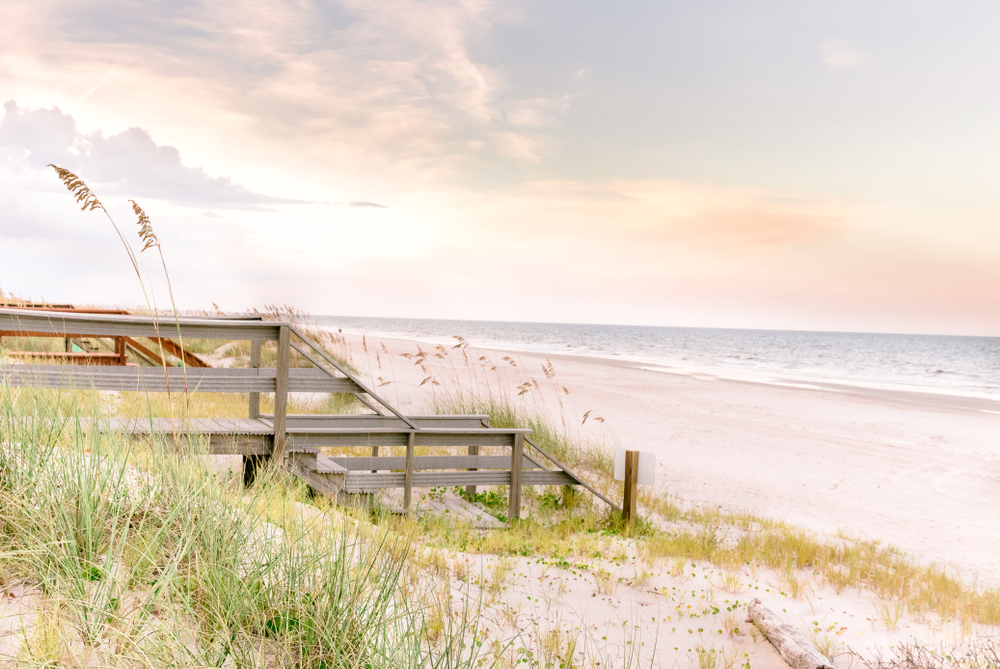 wooden stairs down to the sandy beach