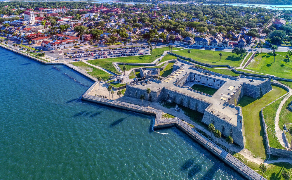 aerial photo of a fort on the waters edge