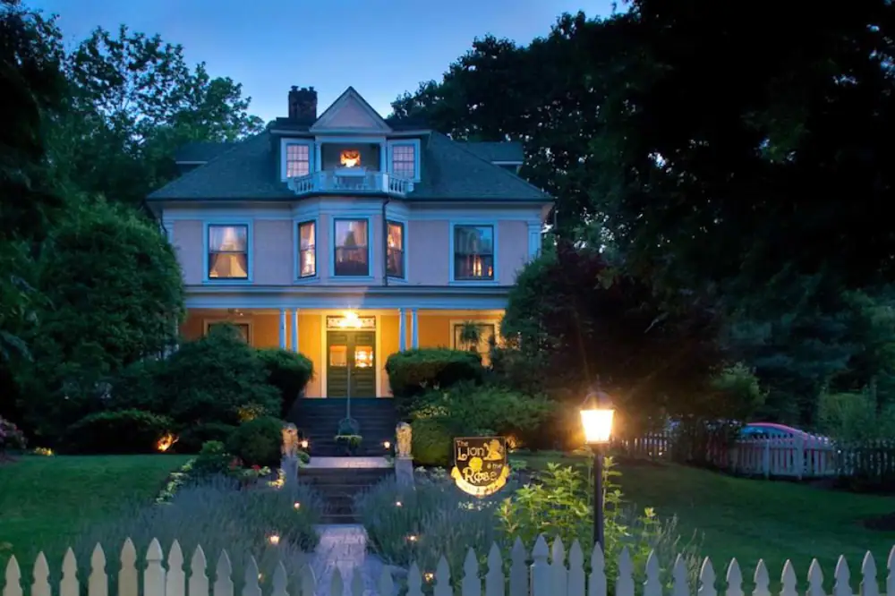 A bed and breakfast in Asheville lit up at night