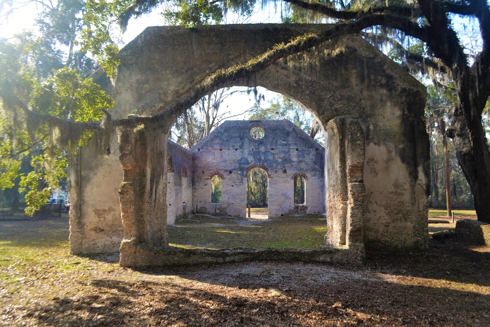 Church ruins with trees dripping with Spanish moss.