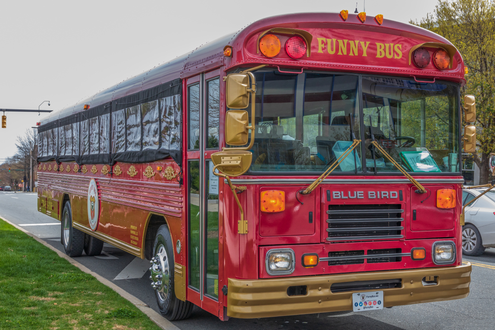 Red Funny Bus parked outside, one of the best things to do in Charlotte.