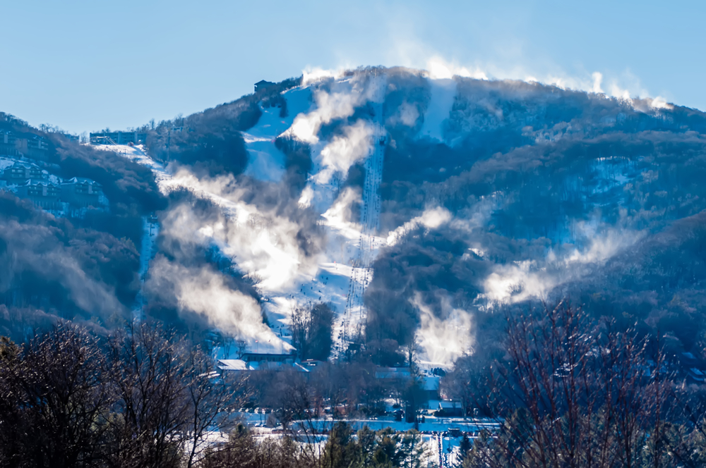 A photo of Sugar Mountain Ski Resort sitting at the bottom of the misty mountain.
