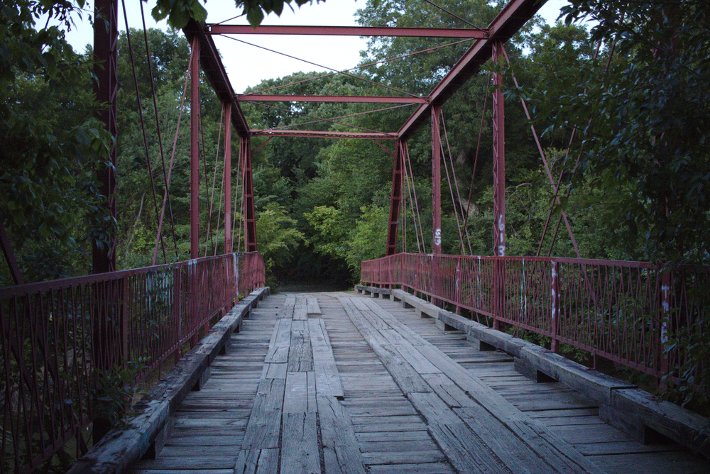 If you are into the paranormal, then it is likely that you have heard of Goatman's Bridge. Known formally as Old Alton Bridge, it is believed locally that the bridge is haunted by a half man, half goat figure, and the legend is truly terrifying as it is heartbreaking
