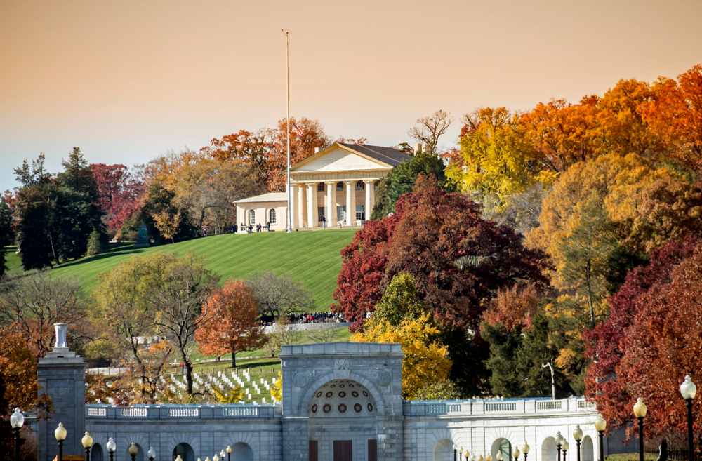 Cemetery and house at Arlington House national park surrounded by trees during the fall.