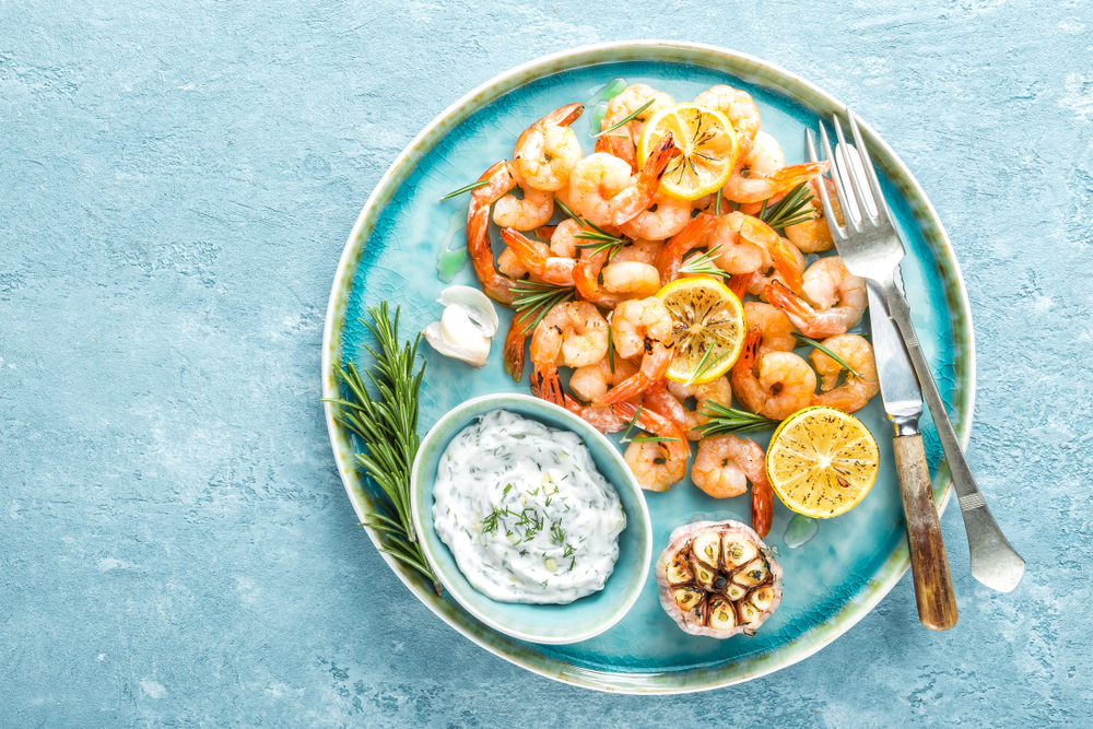 Aerial view of grilled shrimp on a plate, representing Augusta Fish Market and Restaurant.