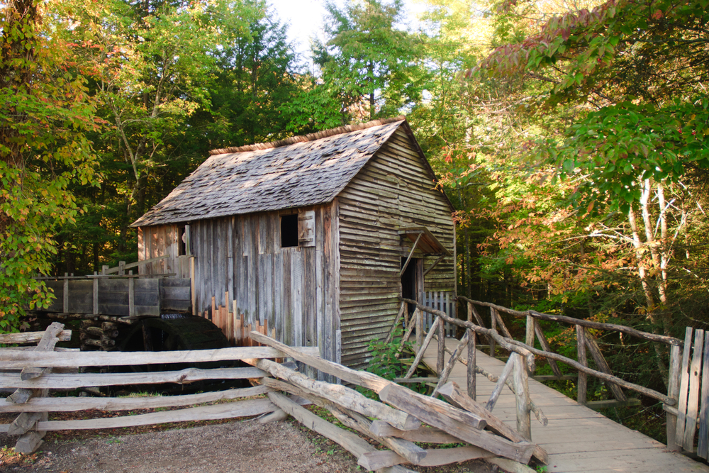 An old, wooden mill in Cade's Cove, one of the best things to do in the Smoky Mountains.