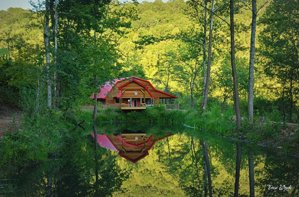 one of the coolest cabins in kentucky, cabin near pond in the woods